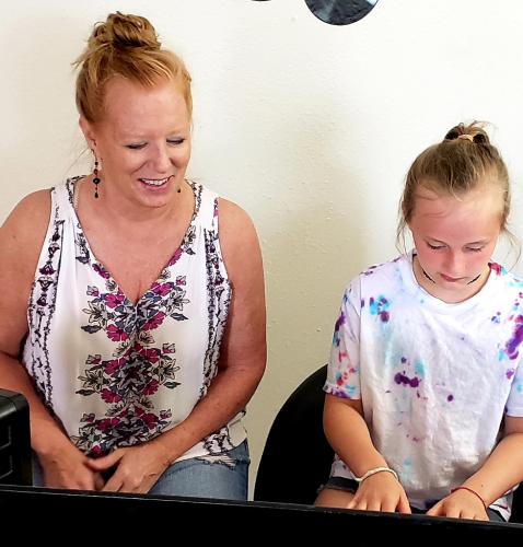 Jenny Rogers with Piano Student
